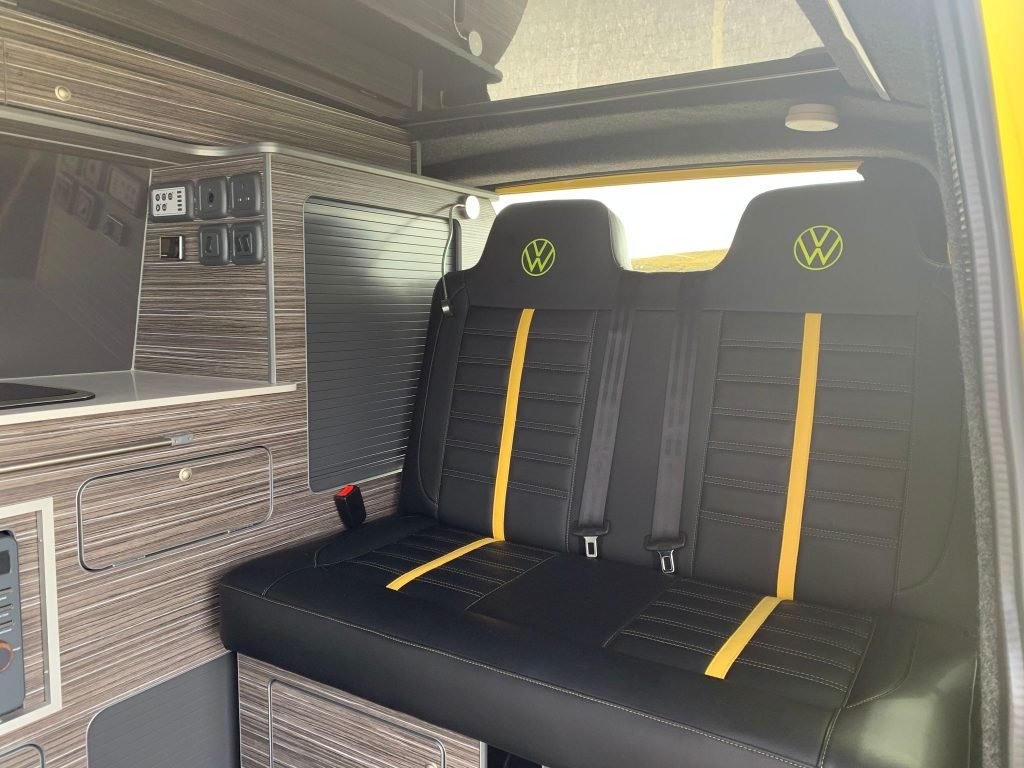 Internal view of the VW Campervan showing back seats and rib bed.